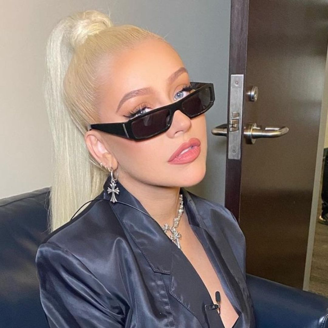 Christina Aguilera's silky all-black ensemble has fans feeling the heat