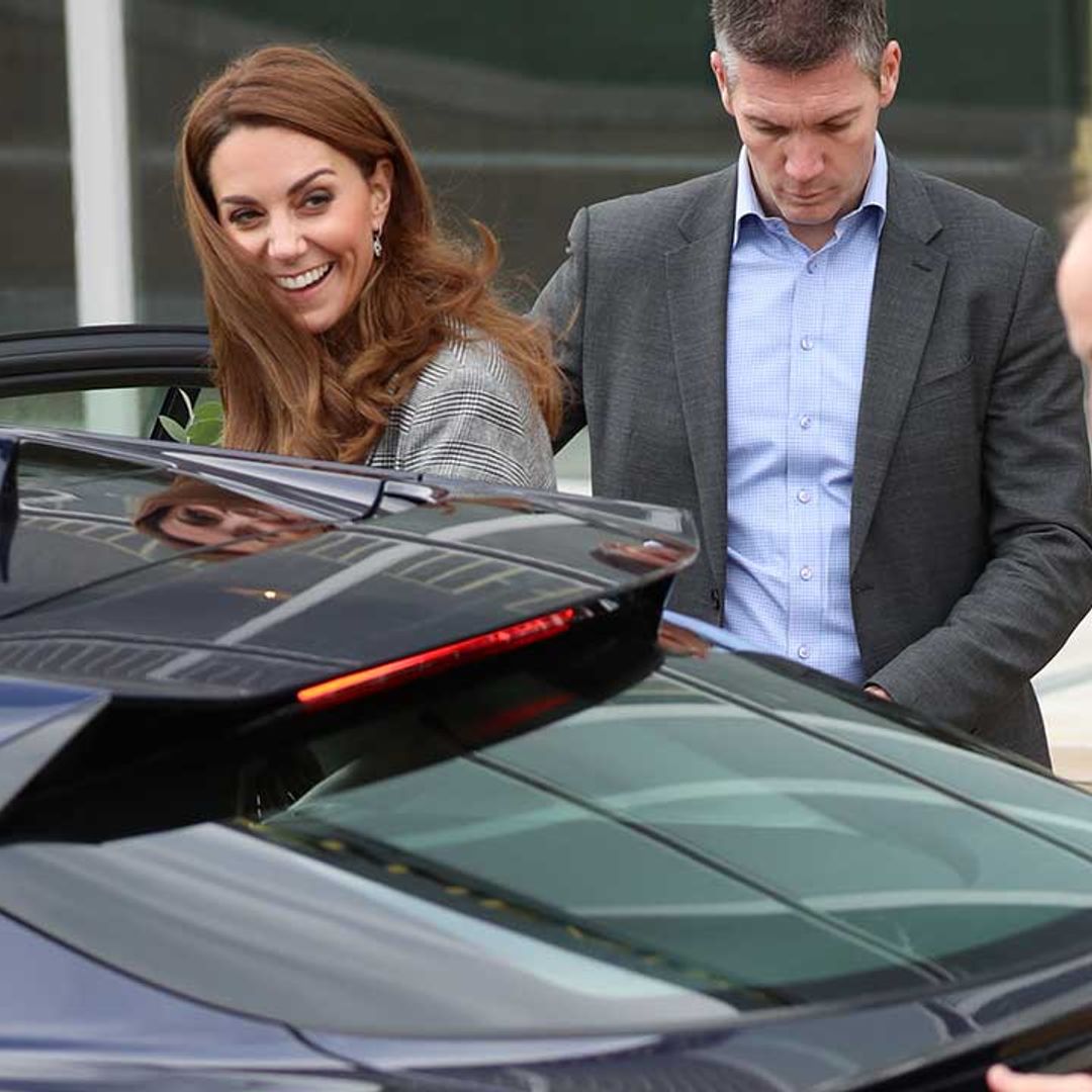 Kate Middleton graciously laughs as she almost trips in high heels - video