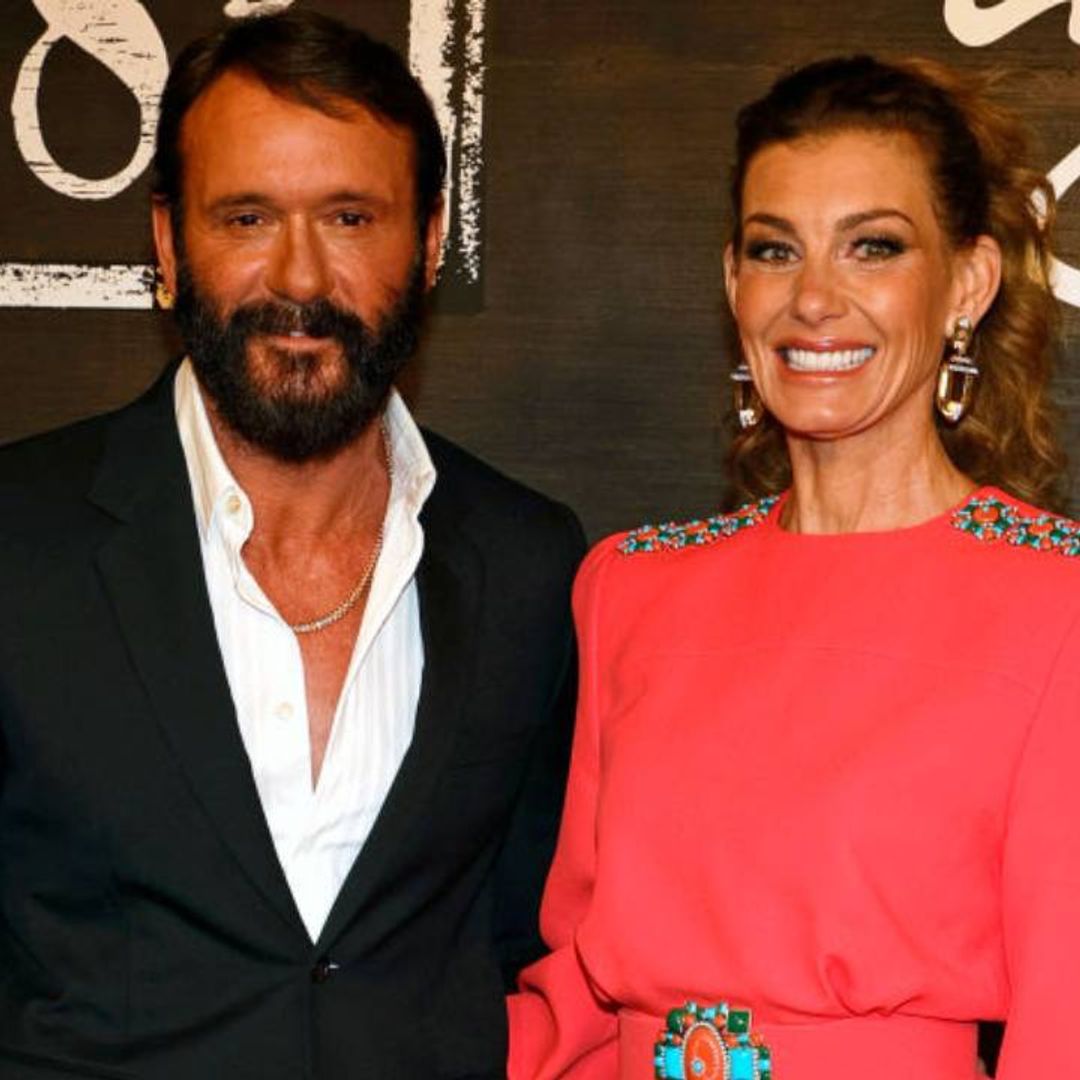 Faith Hill and Tim McGraw steal the show with very glam red carpet appearance
