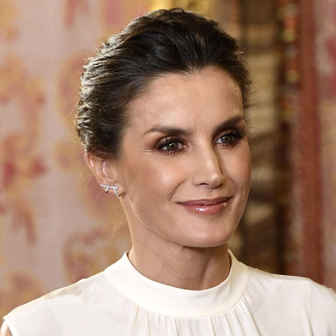 Queen Letizia channels Meghan Markle in a monochrome top and skirt combo