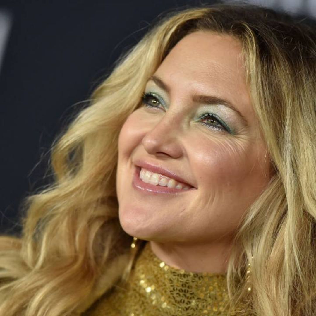Kate Hudson models a multitude of swimsuits in sun-drenched photos