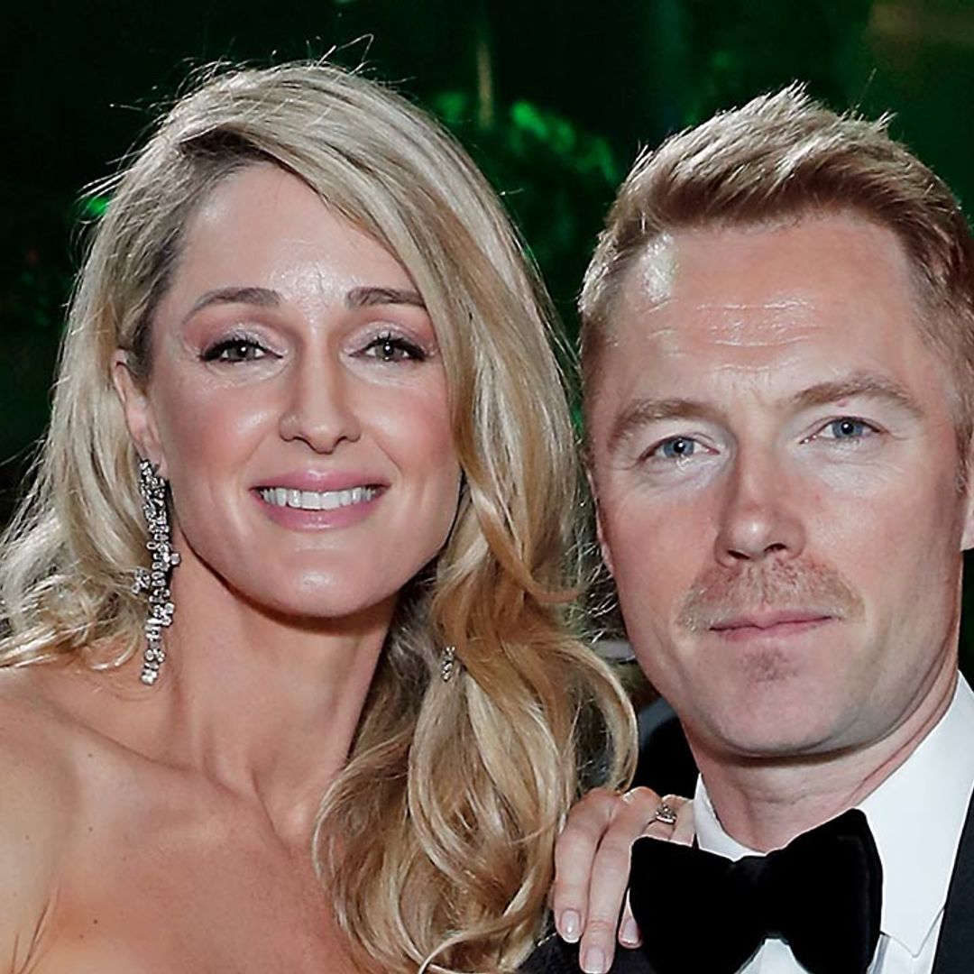 Pregnant Storm Keating shows off her baby bump in a strapless blush pink gown