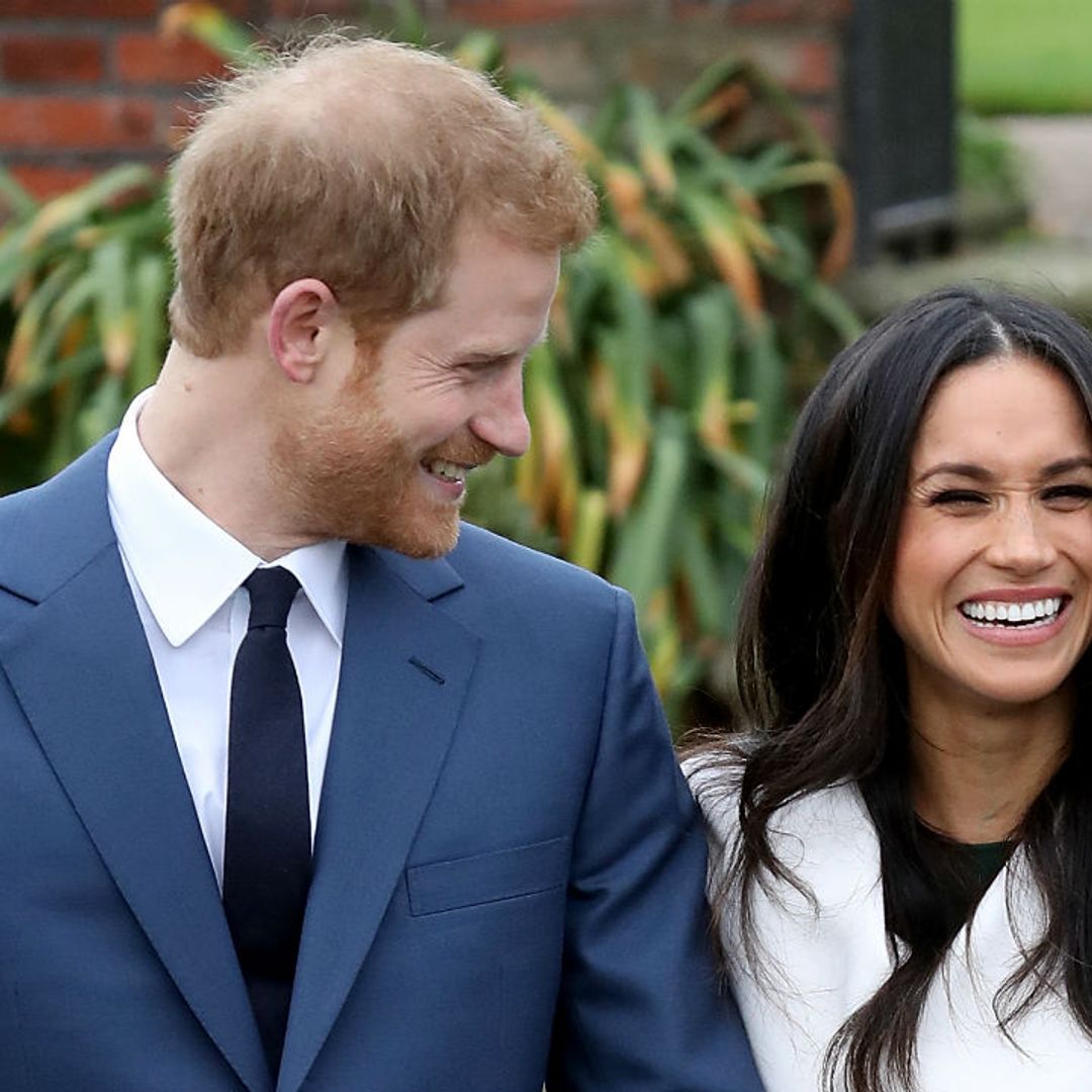The sweet moment Prince Harry was caught looking lovingly at wife Meghan's baby bump