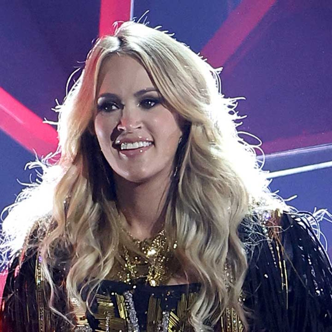 Carrie Underwood steals the show at 2022 CMAs in tiny leather shorts