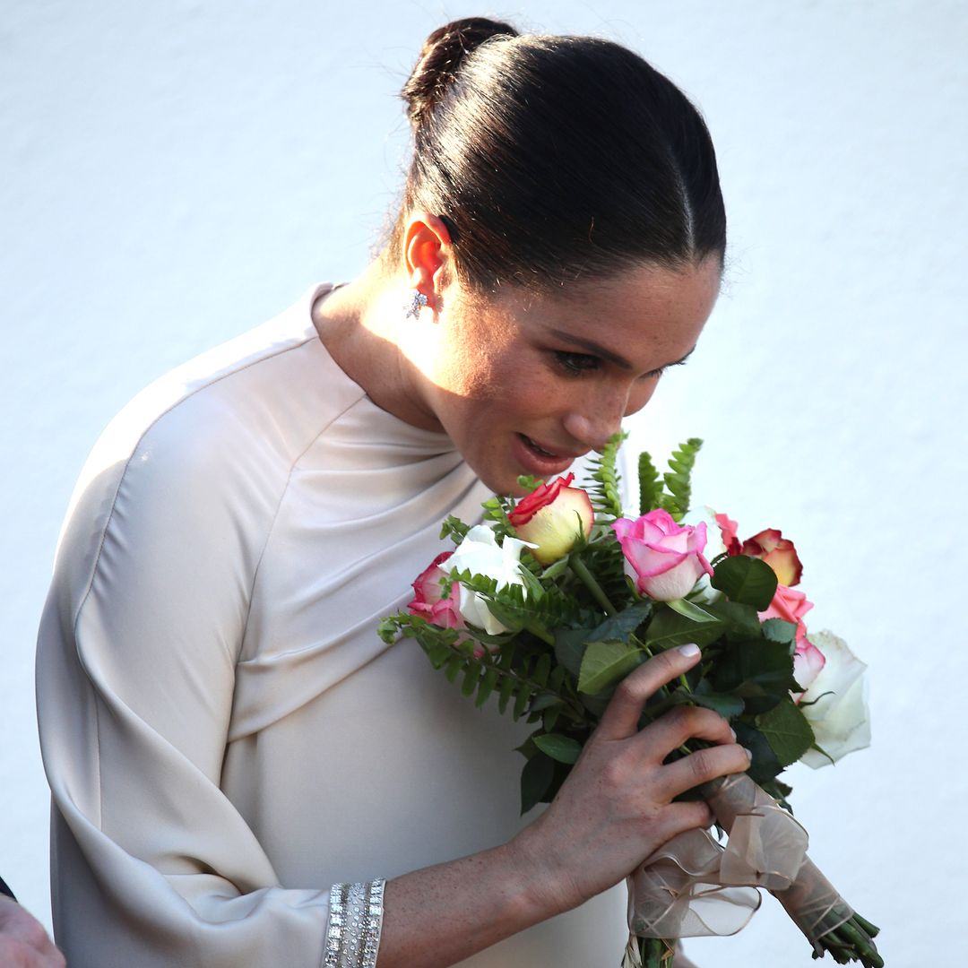 Prince Archie presents Meghan Markle with flowers as she works from $14m mansion