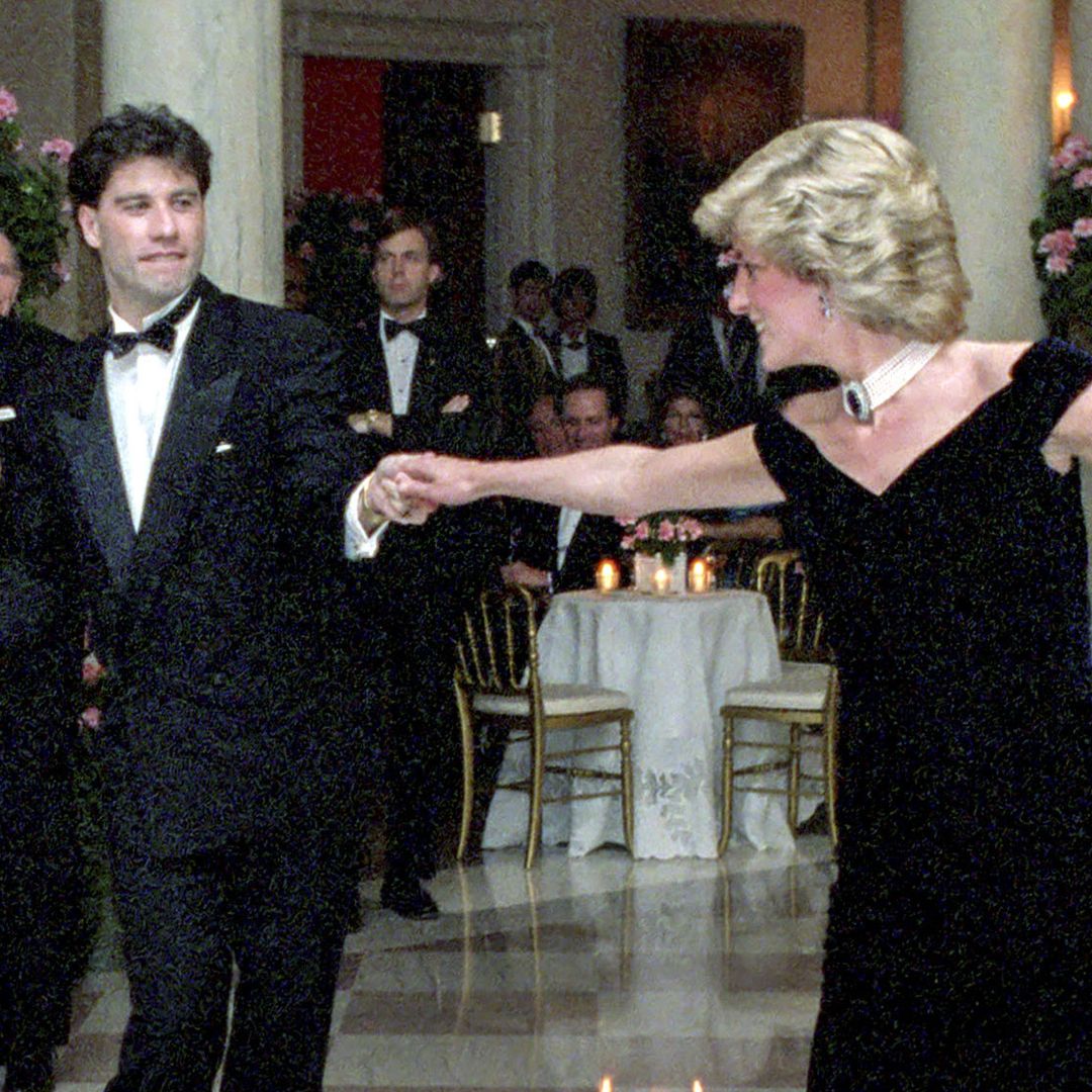 John Travolta references 1985 dance with Princess Diana as he presents Prince Harry with aviation honor