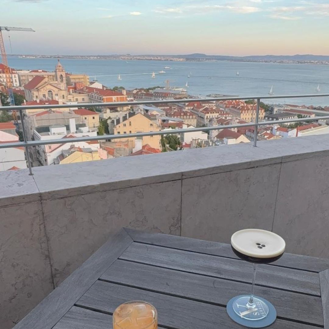 Cocktails at sunset on the rooftop terrace in Lisbon