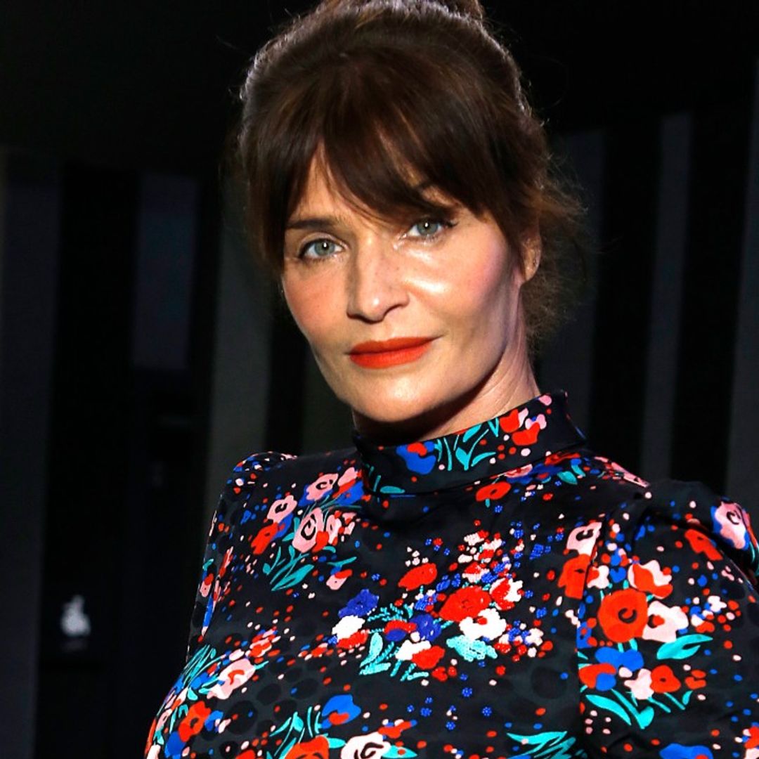 Helena Christensen showcases incredible figure in red swimsuit during freezing Christmas swim