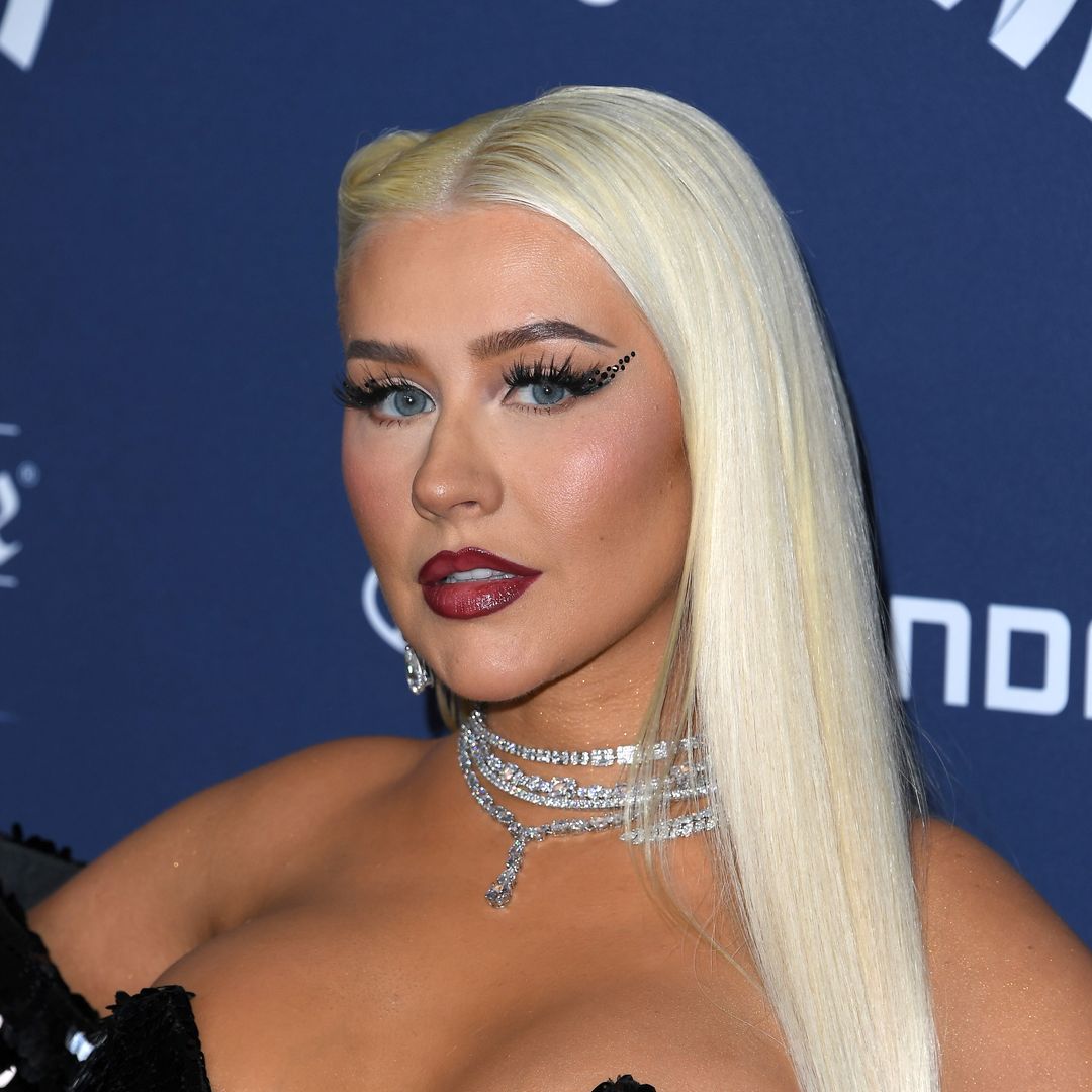 Christina Aguilera looks phenomenal exposing bejeweled chest in low-cut dress – wow!