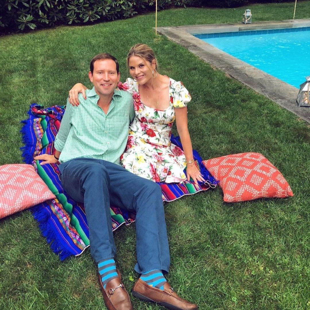 Jenna and her husband Henry Hager by their pool