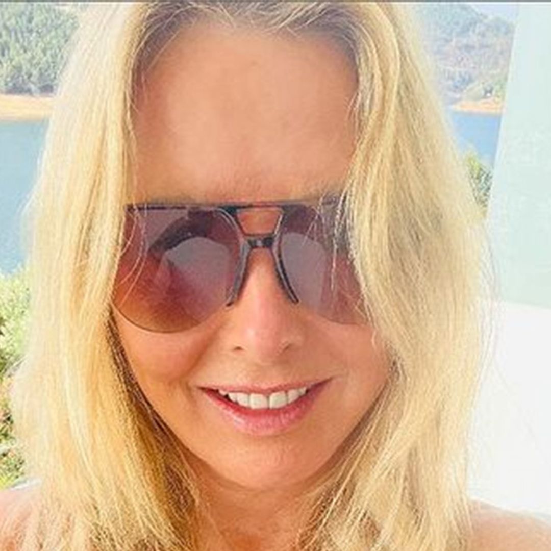Carol Vorderman shows off astonishing abs in poolside bikini photo - fans react