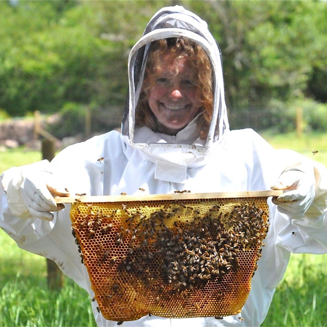 Kate Humble holding bees