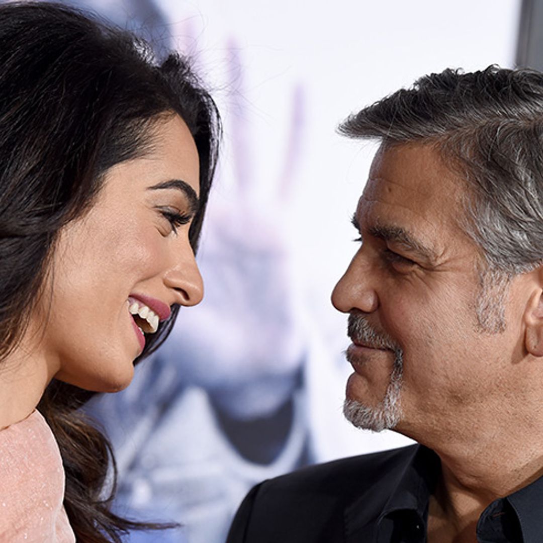 George and Amal Clooney hand out free headphones on flight with baby twins
