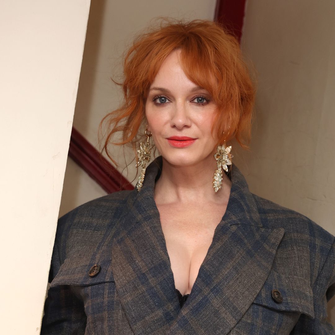 Christina Hendricks steps out in a semi-sheer figure-hugging gown – and check out her insane heels