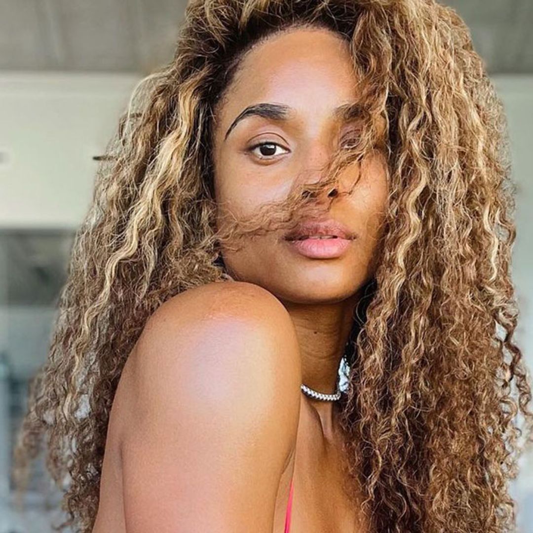 Ciara sizzles in cut-out swimsuit in jaw-dropping beach photos