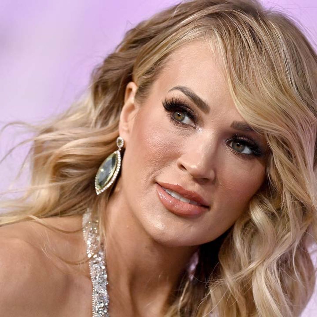Carrie Underwood looks seriously incredible in rippling thigh-split dress
