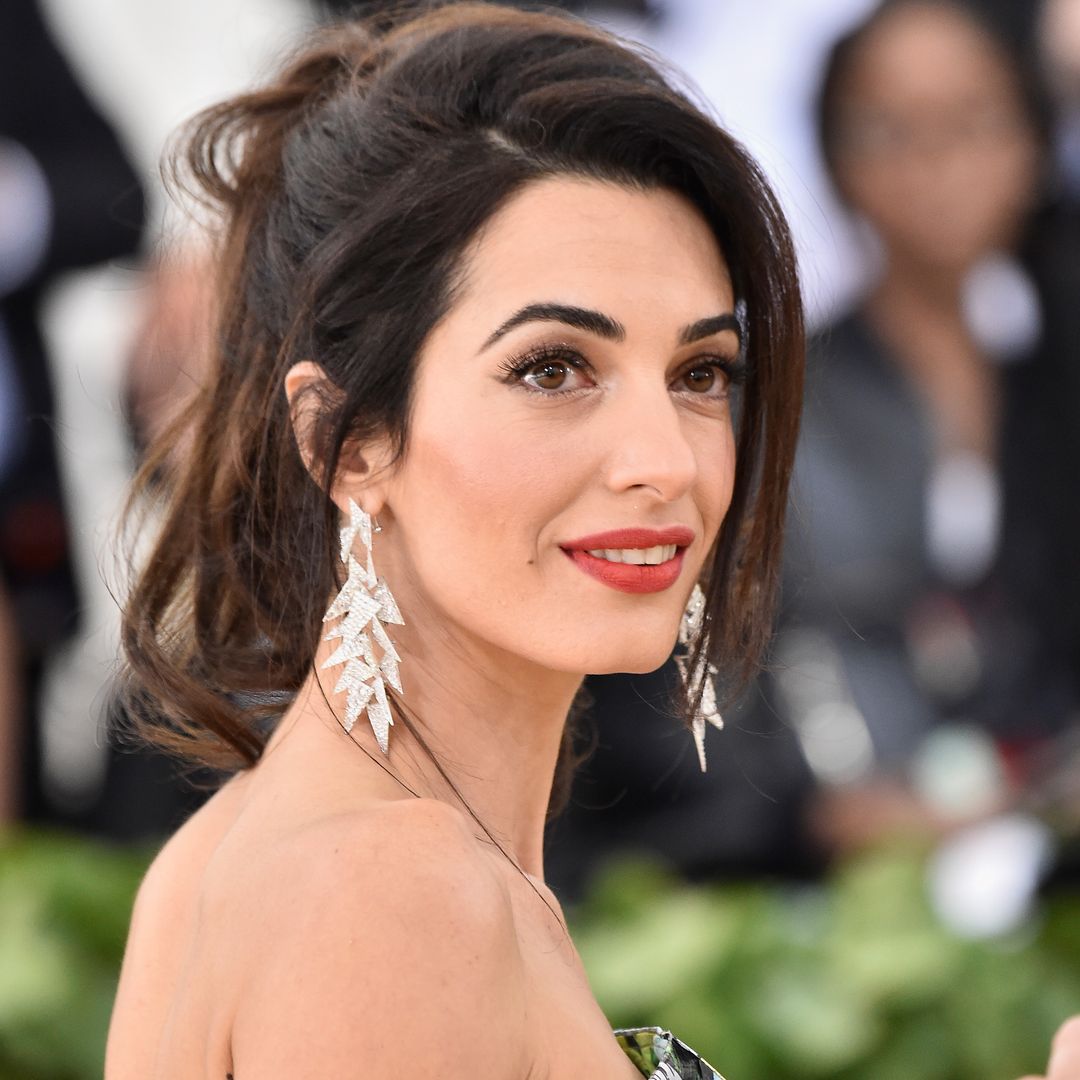 Amal Clooney divides HELLO! readers with style husband George brands 'eccentric'