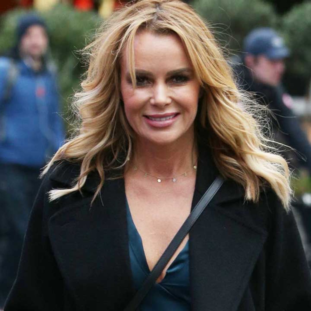 Amanda Holden shares sweet family moment as she wraps up warm in a classic coat for Christmas Eve Eve