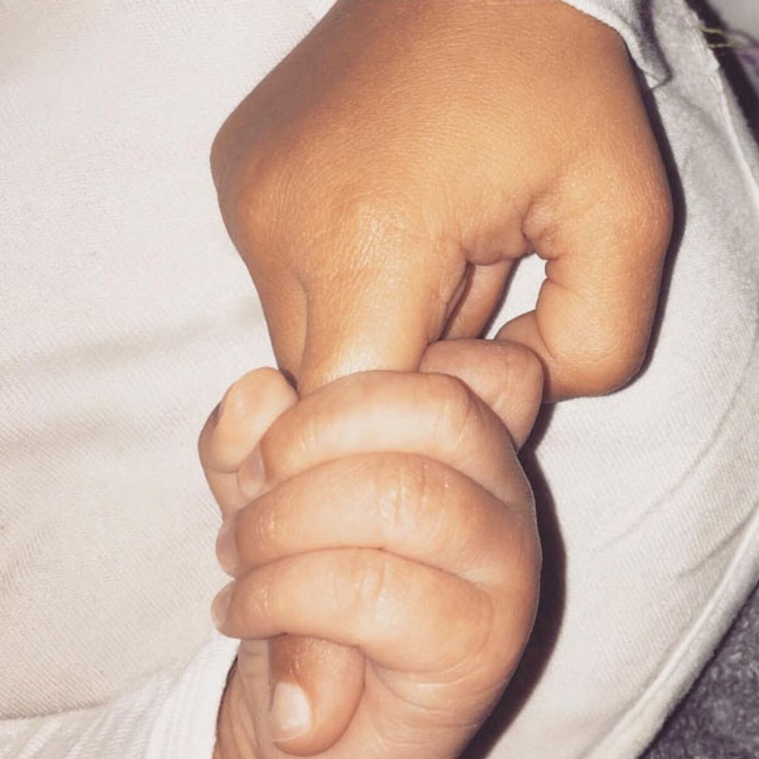 Kim Kardashian shares first picture of son Saint – and it's adorable