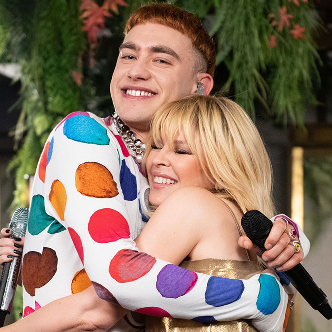 Kylie Minogue shimmies in slinky gold two-piece as she joins Olly Alexander at secret gig