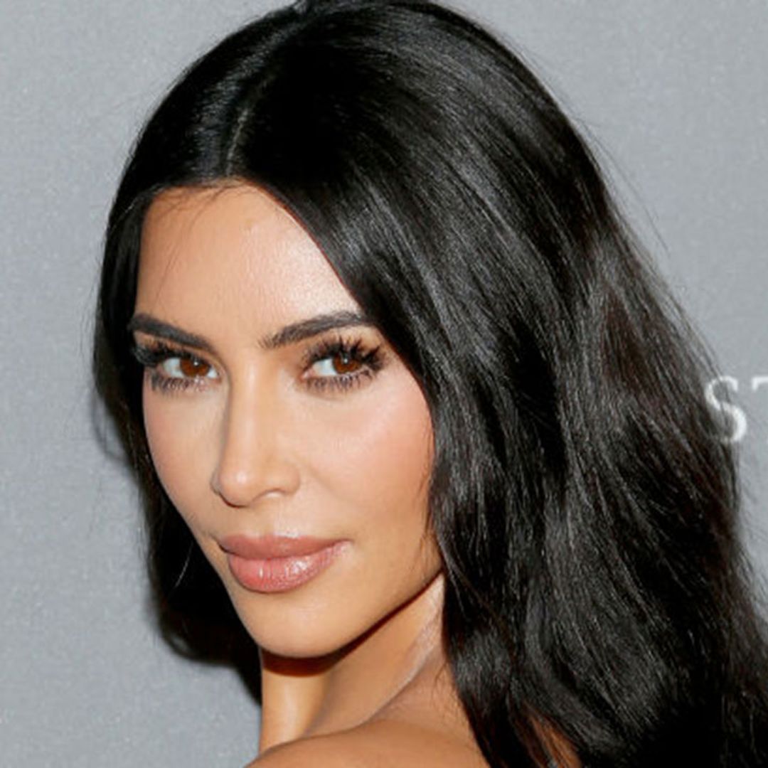 Kim Kardashian models her new SKIMS teddy loungewear and it looks perfect for fall