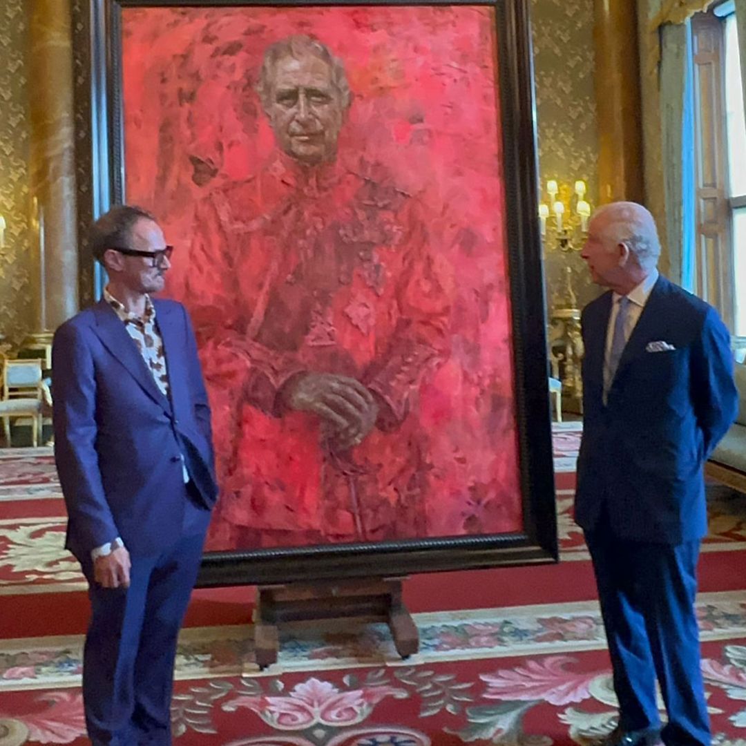 King Charles reacts as he unveils his first official portrait