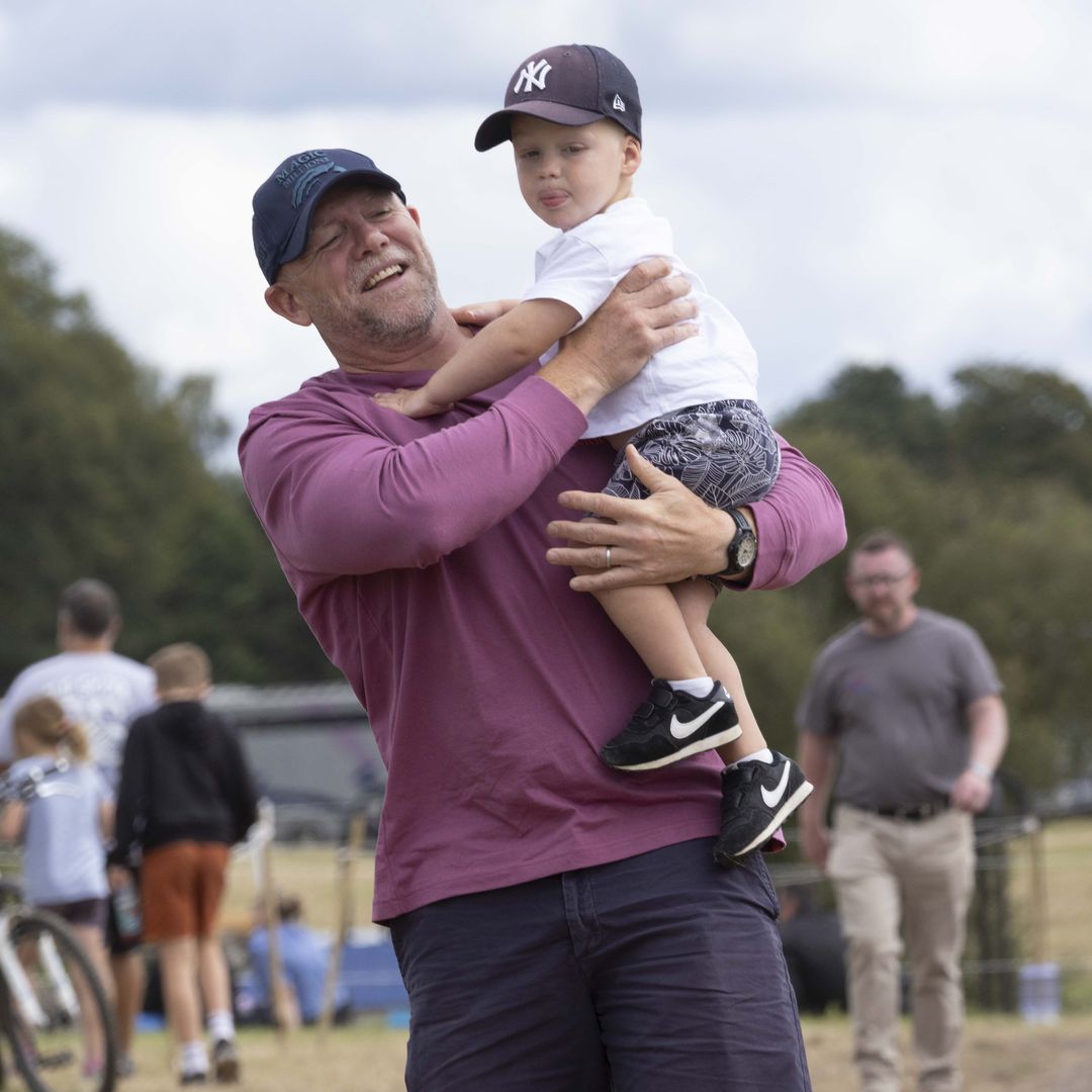 Mike Tindall's son Lucas is his mini-me in baseball cap