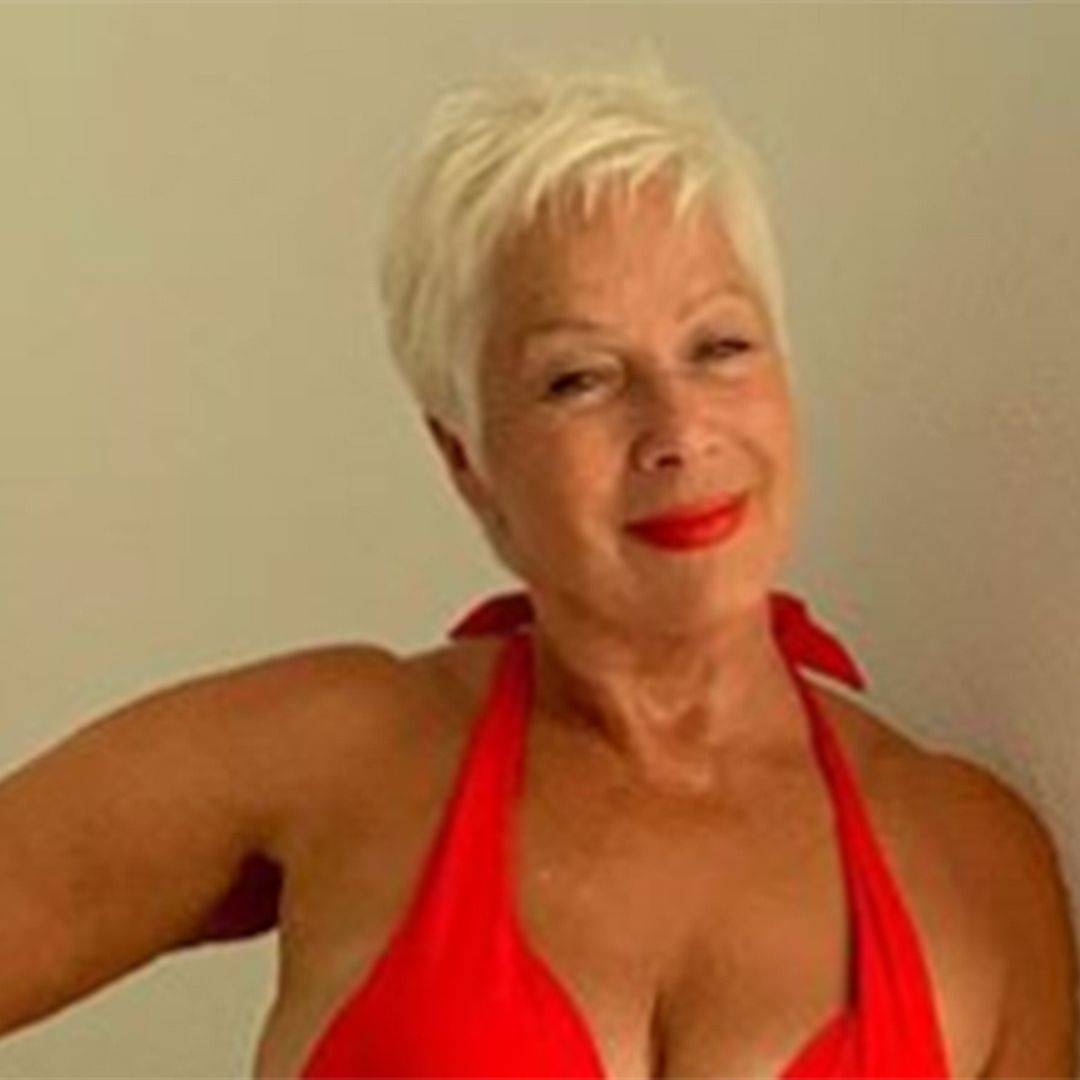 Denise Welch shows off fabulously toned figure in cut-out black swimsuit
