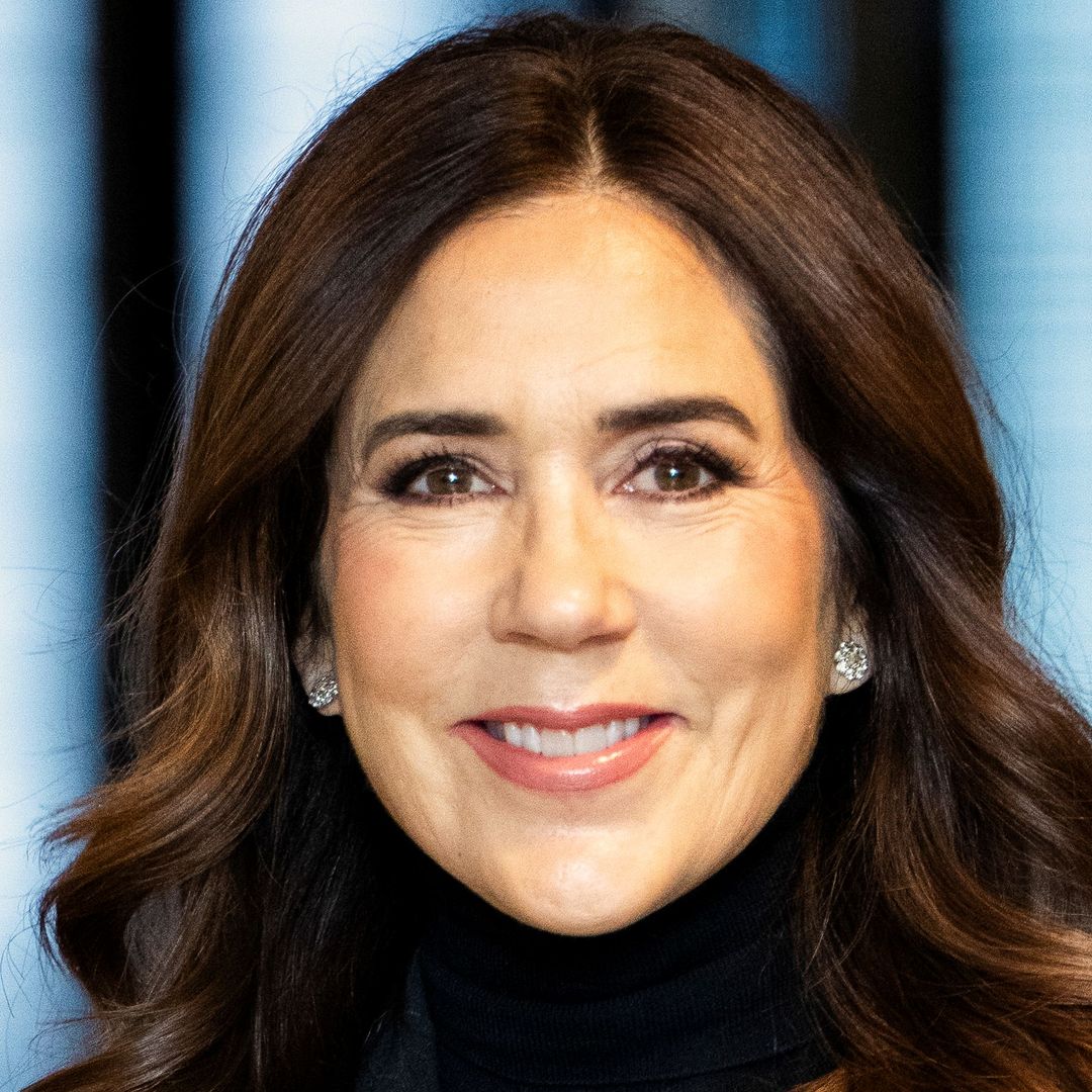 ​Queen Mary is a scene-stealer in knee-high Prada boots​ 