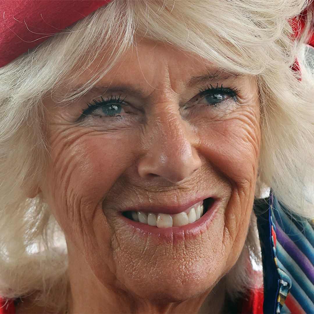 Duchess Camilla is sensational in red alongside The Queen and Prince Charles