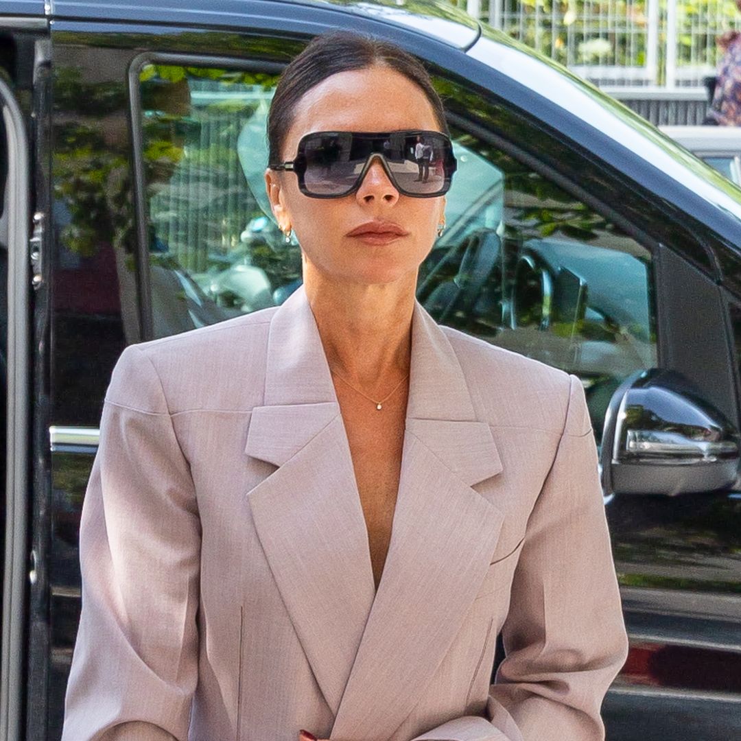 Victoria Beckham's Y2K mini dress and knee high boots combo is so on-trend for 2025