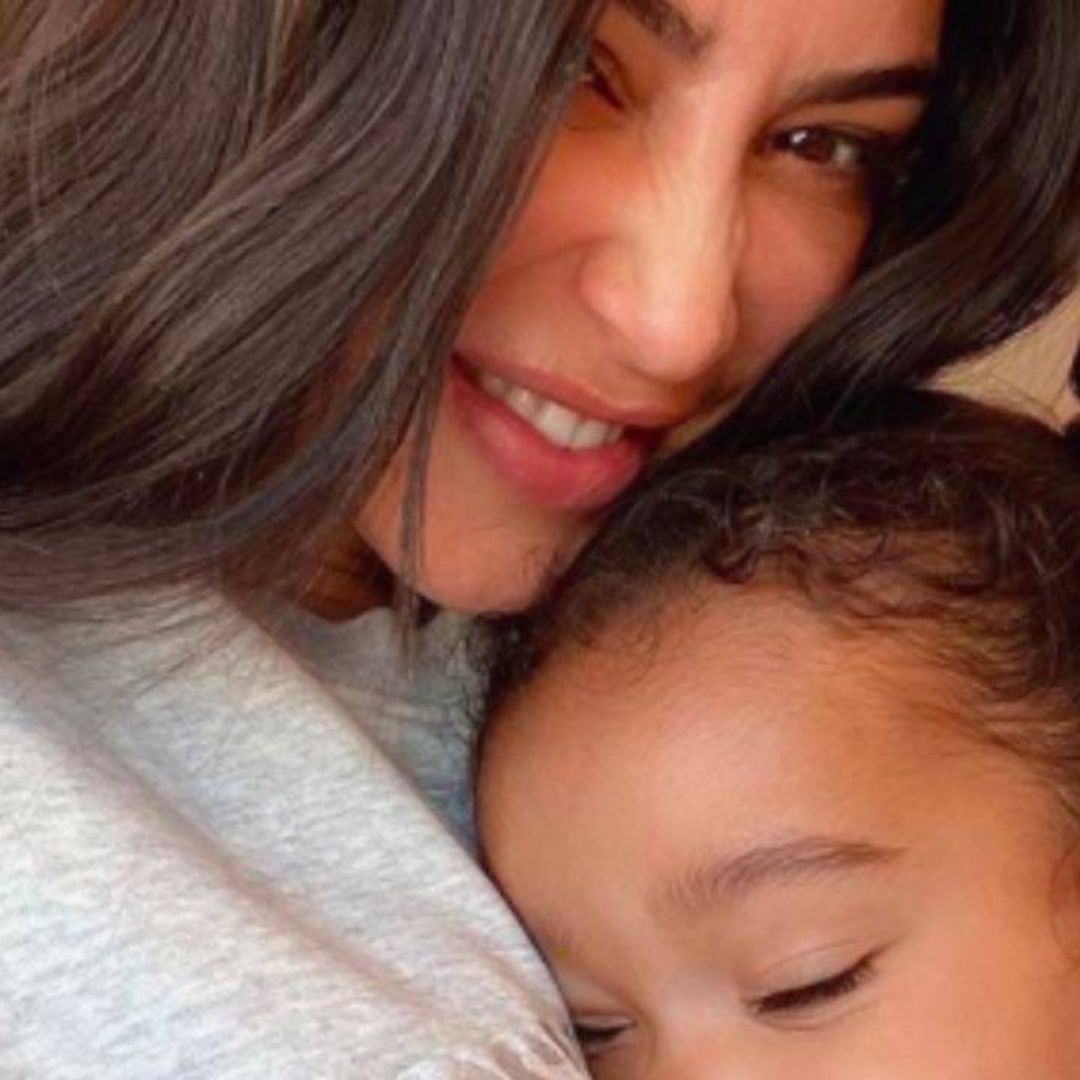Kim Kardashian pictured looking relaxed at family party days before Kanye West meeting