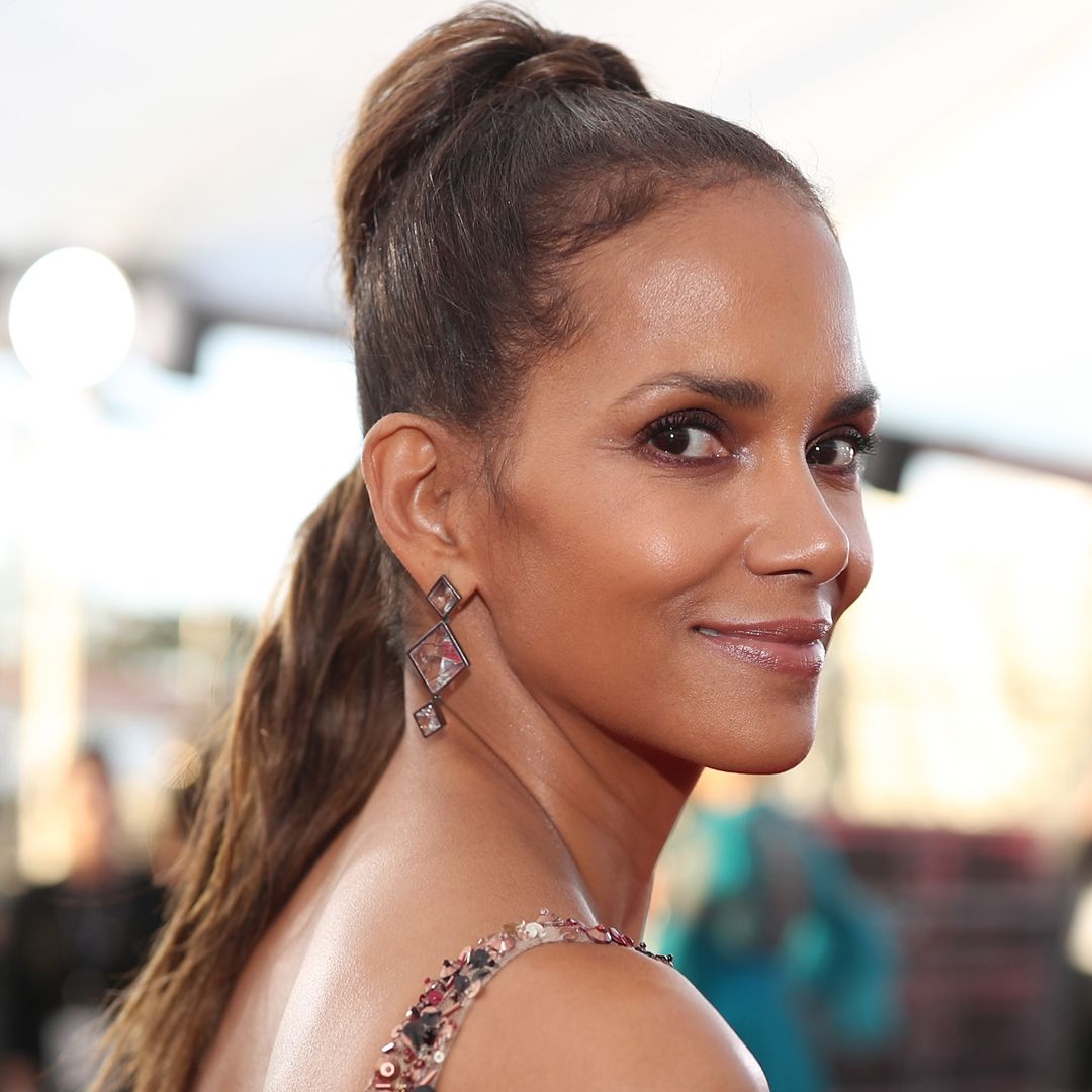 Halle Berry stuns in nothing but bikini bottoms as she marks iconic ...