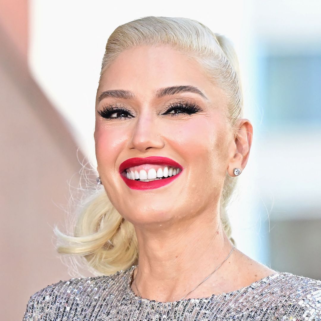 Gwen Stefani channels grungy glam in mini skirt and knee-high boots