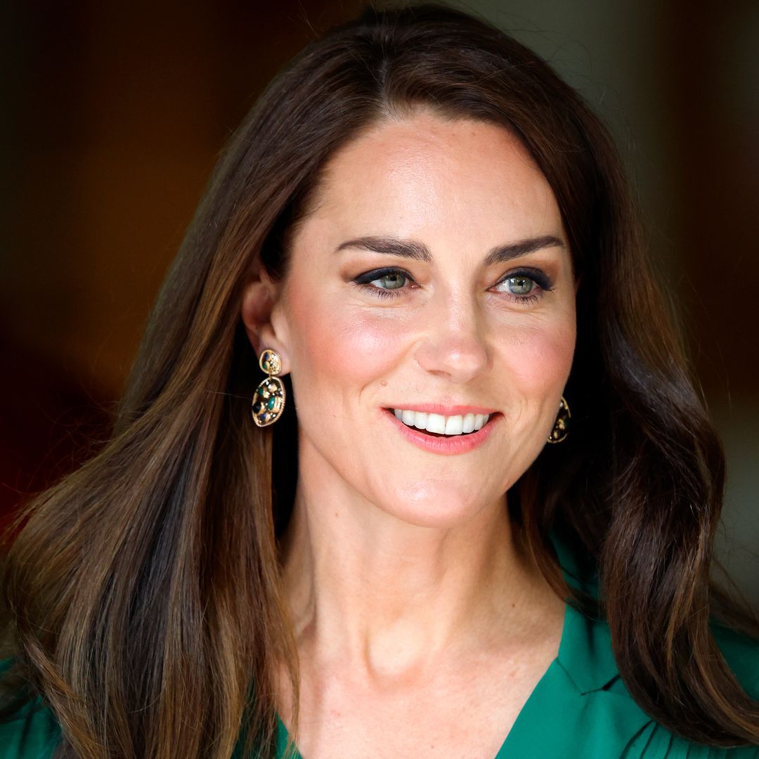 Princess Kate is an autumnal goddess in fitted forest green suit for outing in Leeds