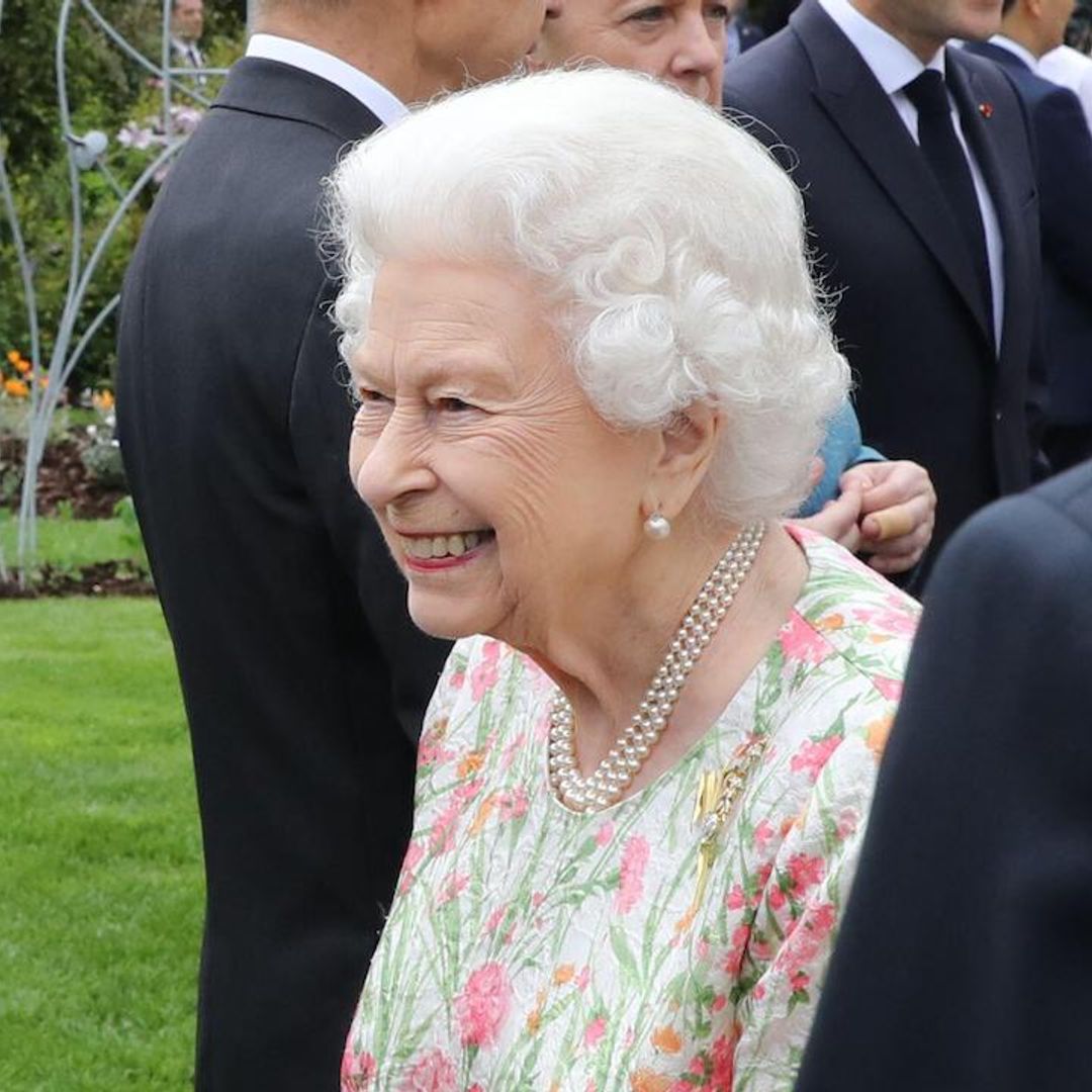 The Queen beams in statement floral dress for G7 summit