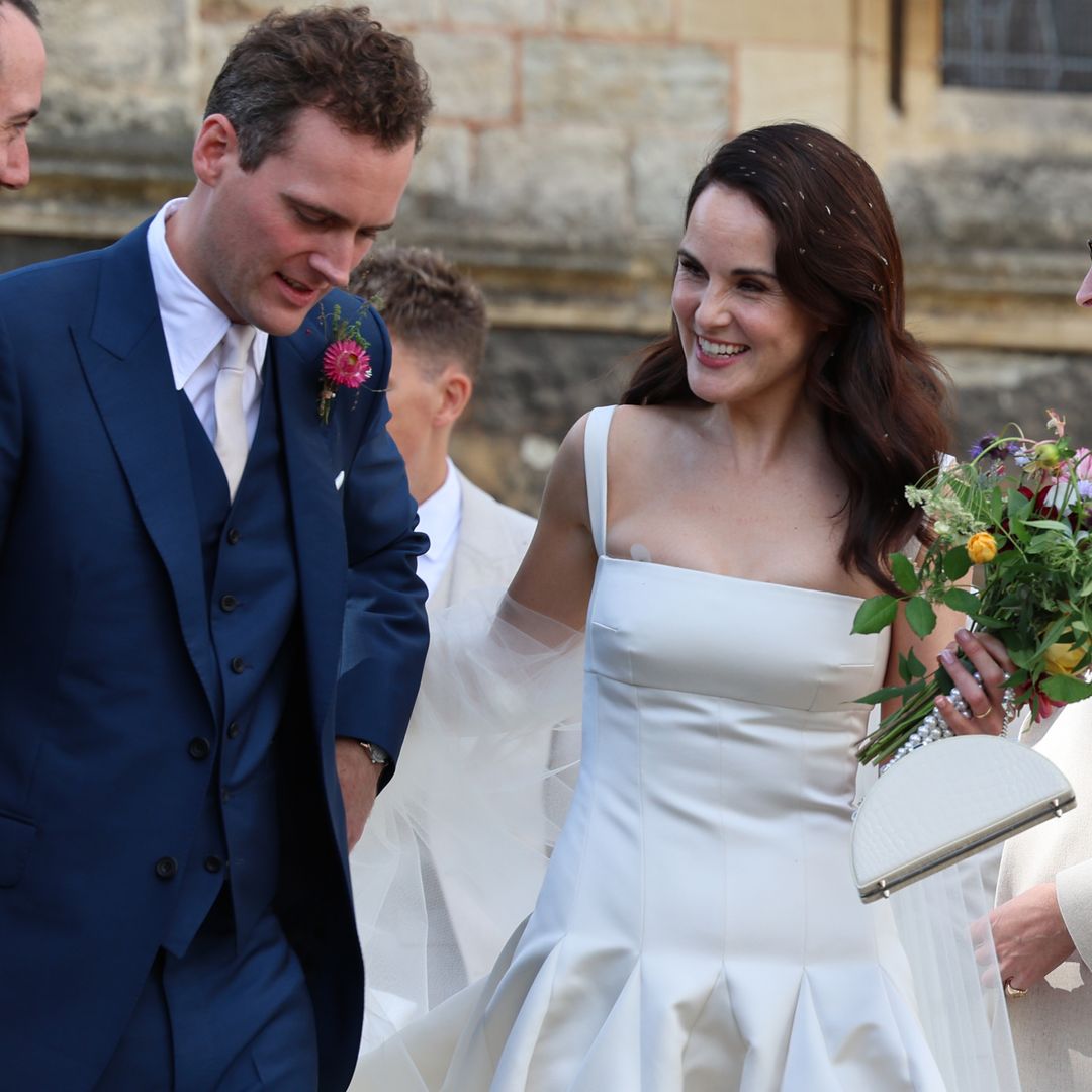 Downton Abbey star Michelle Dockery stuns in satin white gown as she marries Jasper Waller-Bridge in front of glittering crowd - photos