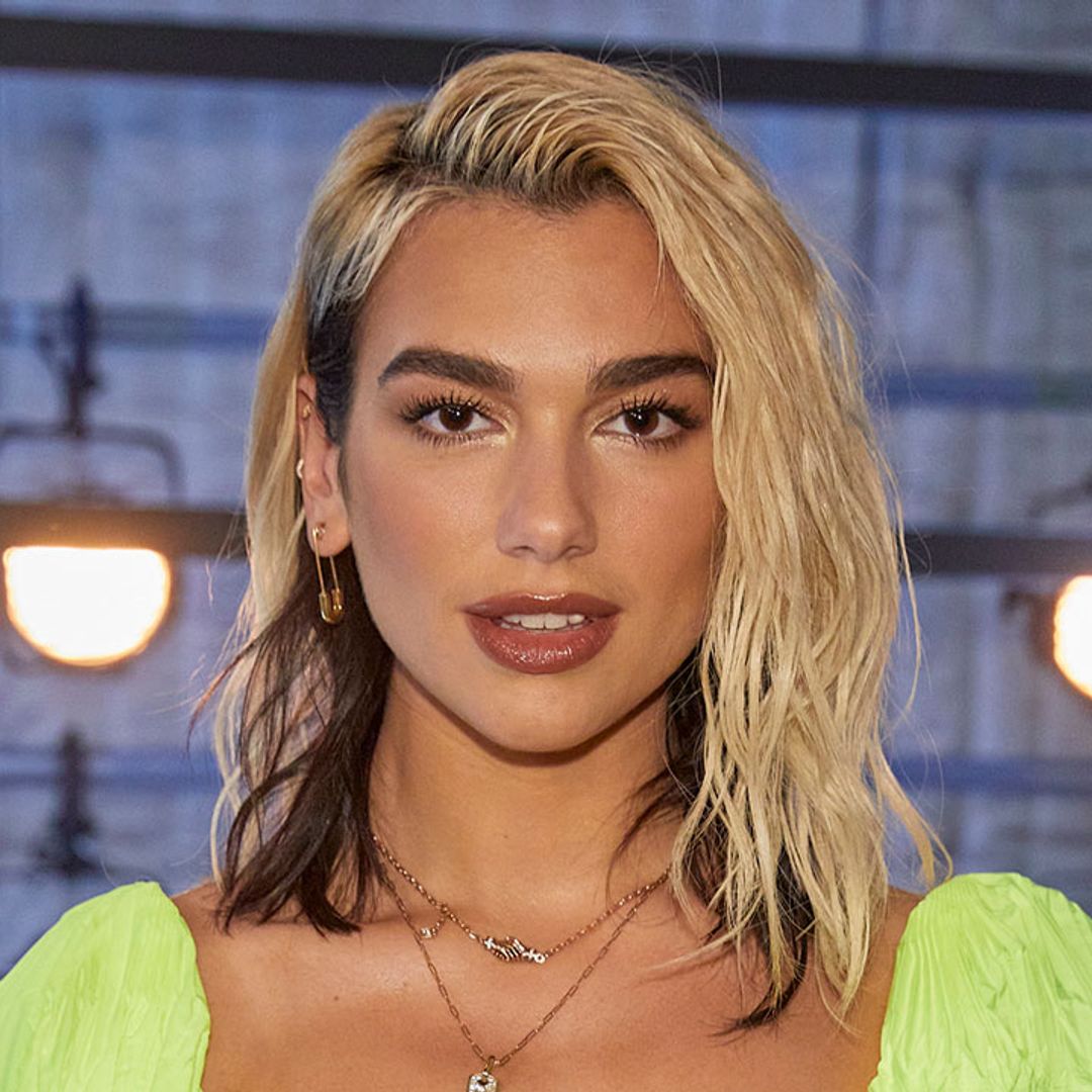 Dua Lipa's ab-baring crop top causes a stir – and wait 'til you see her trousers