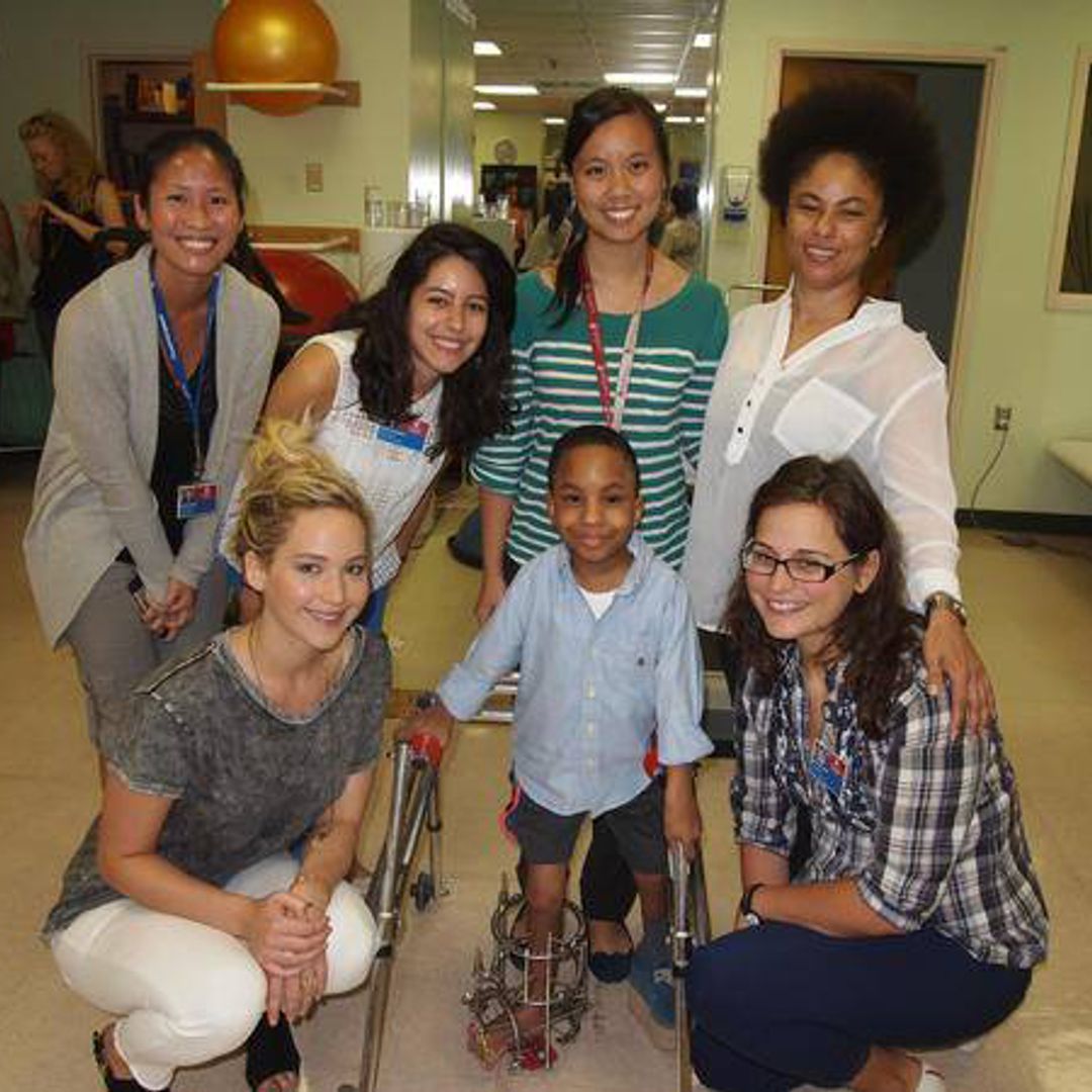 Jennifer Lawrence shares cuddles with sick children in Montreal hospital