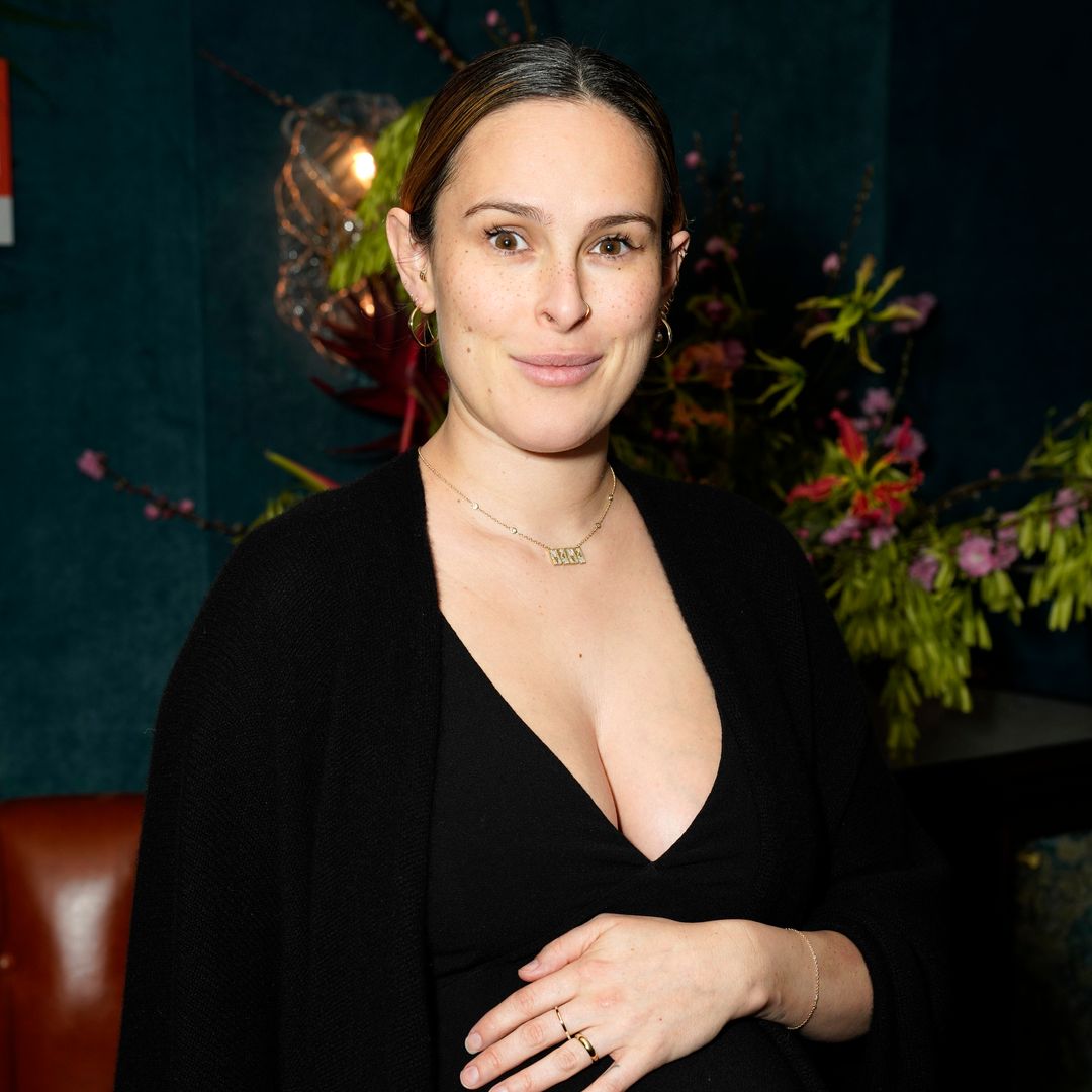 Pregnant Rumer Willis goes makeup-free as she cradles baby bump at West Hollywood event