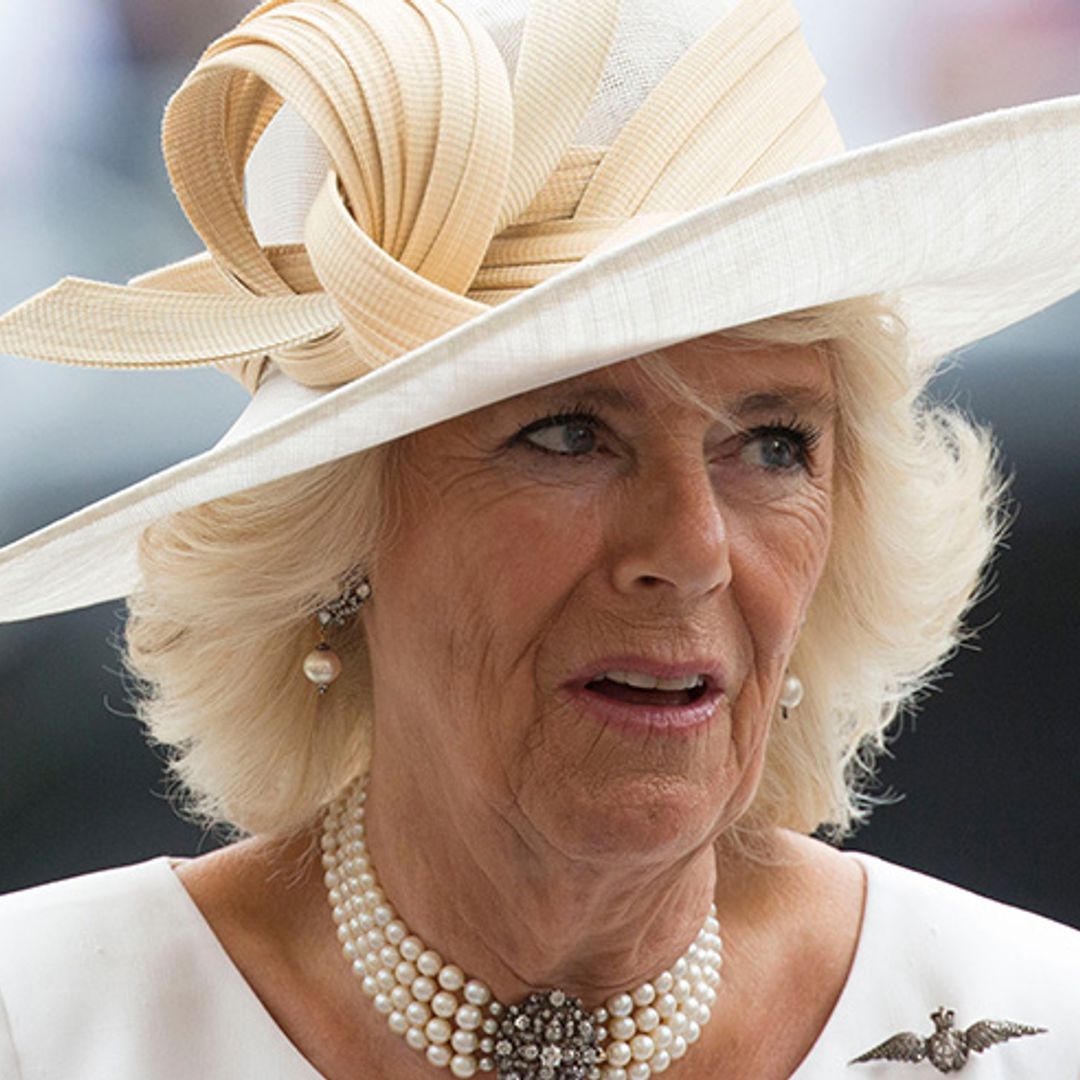 The Duchess of Cornwall looks angelic in top-to-toe white at the RAF centenary event