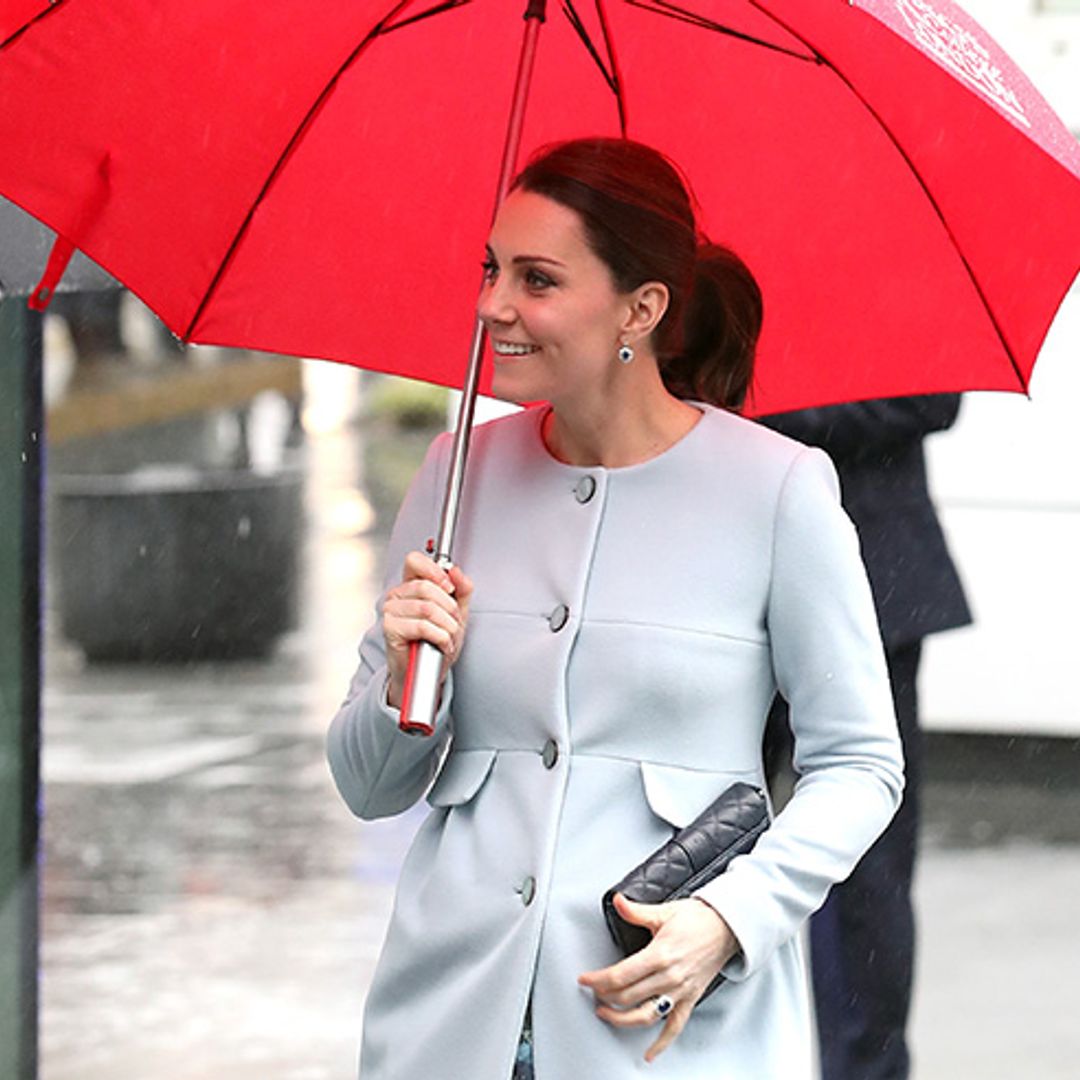 Duchess Kate braves the weather in pastel blue Seraphine coat