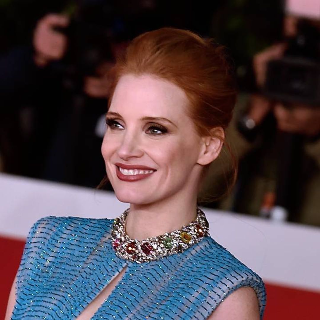Jessica Chastain looks chic as ever donning emerald green mini dress