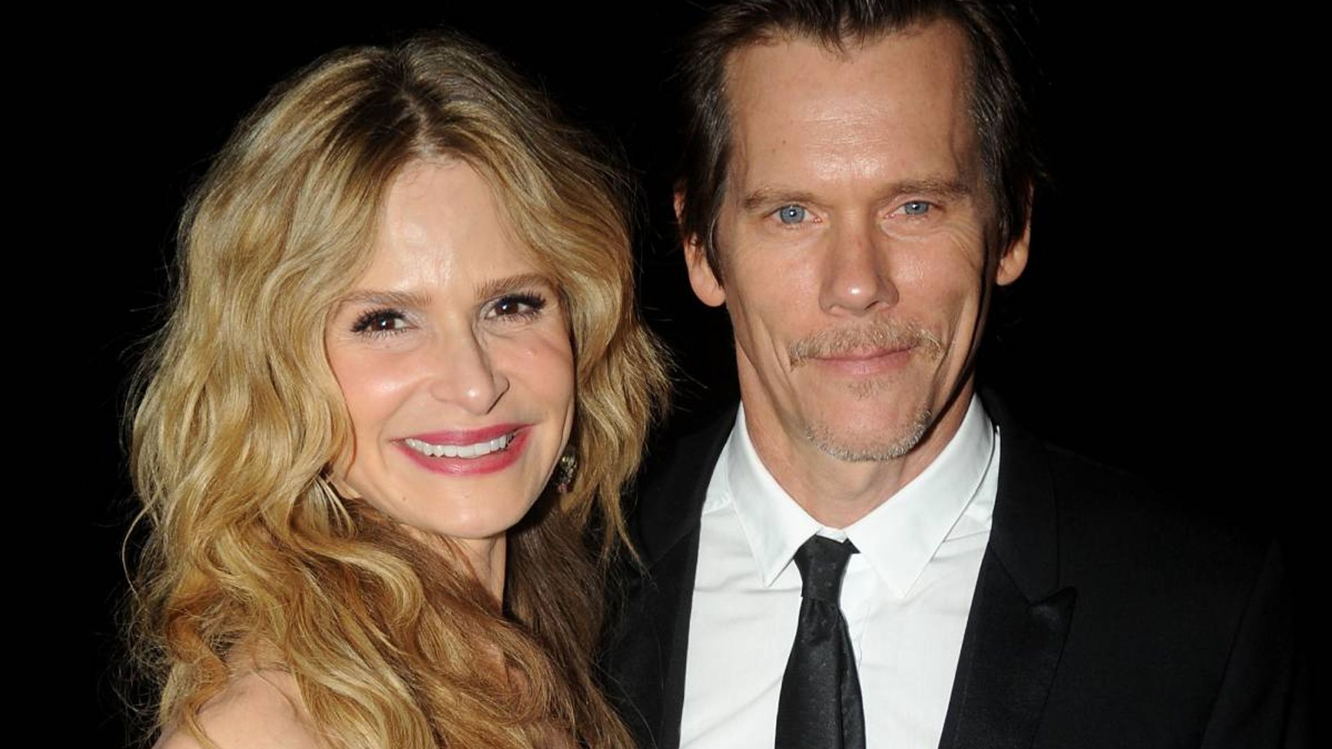 Kevin Bacon and Kyra Sedgwick pose 