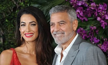 Amal Clooney with George Clooney at the Ticket to Paradise premiere