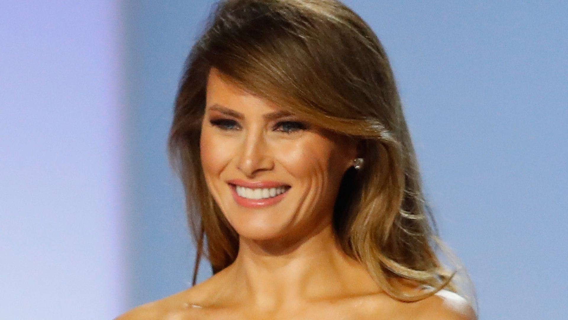 Donald Trump's wife Melania rocks waist-cinching wedding guest dress to