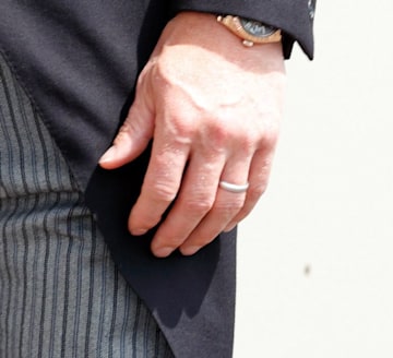 Mike Tindall's silver ring on his left hand