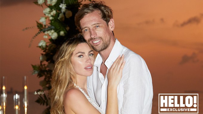 Abbey Clancy leans on her husband Peter Crouch at wedding renewal ceremony in Maldives