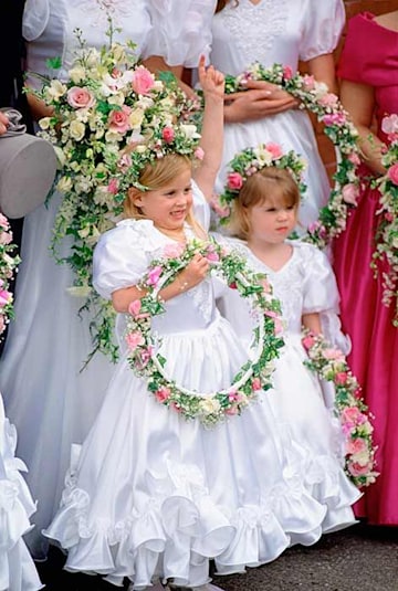Princess Beatrice and Princess Eugenie twinning at Alison Wardley's wedding