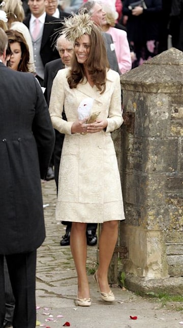 Kate Middleton in a cream coat dress at Laura Lopes' wedding